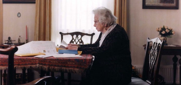 Miep Gies reading the incoming letters, June 2001. Photo by Bettina Flitner.