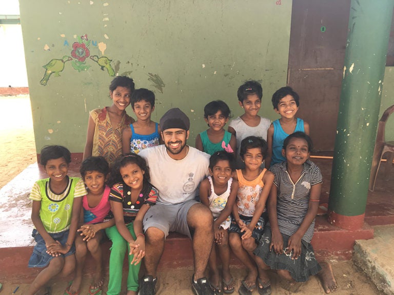 Amanvir with girls at a Sri Lanka orphanage