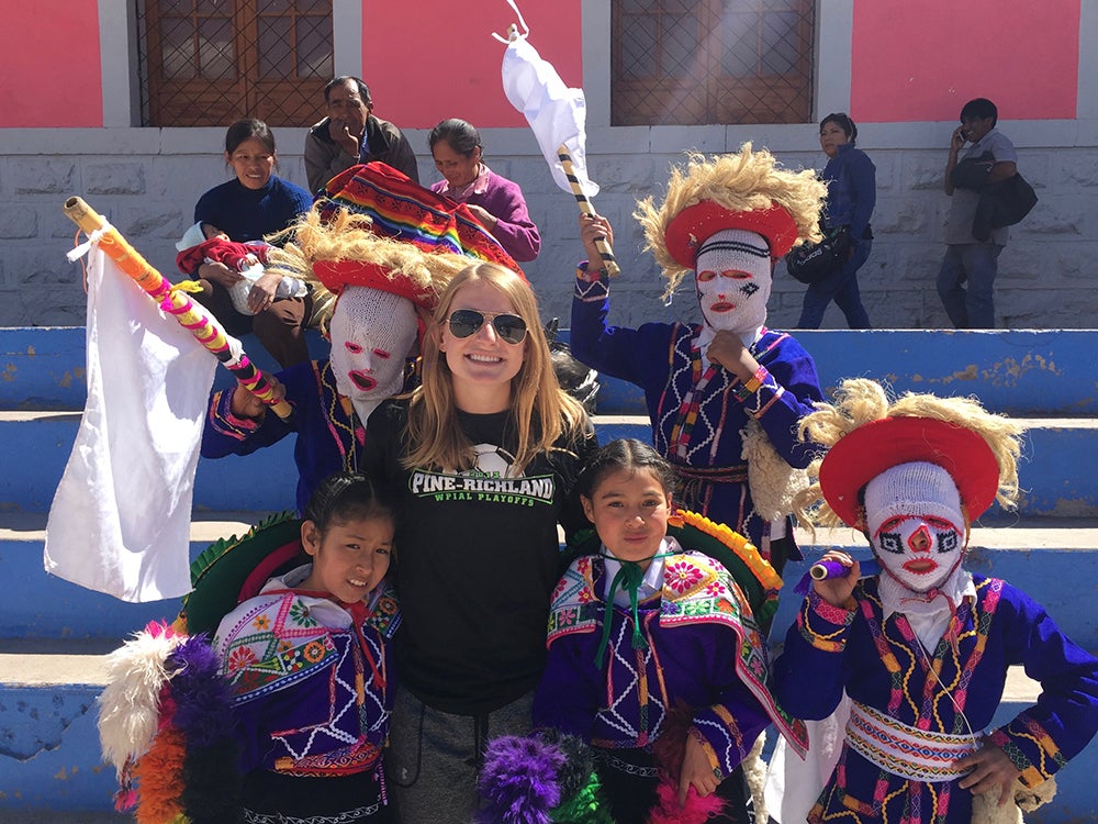 Maggie with children from Peru
